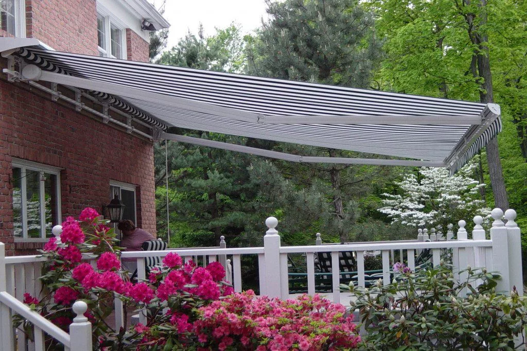 Retractable awnings are a great source of shade, and many homeowners and businesses choose them as a shading solution for their properties. Thanks to them, family, friends and customers stay away from the harmful UV rays and enjoy a fantastic place to relax and unwind. Retractable awnings can also protect you and your outdoor furniture from light rain, add curb appeal and privacy to your home and reduce the indoor temperature. But what happens if you live in a more windy area like Alaska, Wyoming, Michigan, Wisconsin or Montana? Can retractable awnings withstand wind, and are they worth the investment? How much wind can an awning withstand, and which model is good for the area where you live? Many online vendors throw around the terms "wind resistant awnings," "windproof awnings," and "stormproof awnings," but what do they mean and are they good enough for your home or business? Today's article will shed light on all those questions and discuss the best retractable awnings for windy areas. Best retractable awnings for windy areas If you live in a windy area, but the summer sun is blazing hot, and you need to create a shady outdoor living space, you might consider installing a quality retractable awning. But how do you know how much wind can a retractable awning withstand? This section will discuss the retractable awning wind rating and which are the best awnings for windy areas. Does the vendor mention the model’s Beaufort scale rating? When looking for retractable wind awnings online, always check if the vendor mentions the Beaufort scale rating on their website. Statements and mentions of any other scales and ratings are pointless when discussing retractable awning resistance in windy conditions. What is the Beaufort scale? Britain's Admiral Sir Francis Beaufort created the Beaufort Wind Scale in 1805. The scale rates wind speeds from 0 to 12 based on visual observations while at sea. Today, each force (0-12) is associated with a specific wind speed range (mph or knots). For a more detailed description of each force, refer to the table below. Beaufort scale rating Description Speed (mph) Speed (km/hr) Speed (knots) 0 Calm 0-1 0-1 0-1 1 Light air 1-3 1-5 1-3 2 Light breeze 4-7 6-11 4-6 3 Gentle breeze 8-12 12-19 7-10 4 Moderate breeze 13-18 20-28 11-16 5 Fresh breeze 19-24 29-38 17-21 6 Strong breeze 25-31 39-49 22-27 7 Near gale 32-38 50-61 28-33 8 Gale 39-46 62-74 34-40 9 Severe gale 47-54 75-88 41-47 10 Storm 55-63 89-102 48-55 11 Violent storm 64-72 103-117 56-63 12 Hurricane 72-83 118-132 64-71 *A table of Beaufort scale rating Retractable awning wind speed testing according to the Beaufort scale The Beaufort scale speed test is the most reliable wind testing method in the retractable awning industry. Unfortunately, very few of the available models on the market are Beaufort wind load approved, and thus, only some meet the highest standards in the industry. Keep in mind that most retractable awnings are tested for wind speeds in a controlled lab environment, meaning that outdoor conditions are not always comparable with the testing methods. For example, a steady breeze would affect an awning differently than irregular gusts. In all cases, it's essential to know how to protect an awning in high winds, which we will discuss in the last section of this article. What is the best retractable awning for windy areas? As already discussed, the most reliable wind-resistant retractable awnings are tested according to the Beaufort wind load scale. There are only a few available online, and most of them are offered by the vendor Retractableawnings.com. We have selected the top 5 windproof retractable awnings to help your research and choice. Remember that the ratings and maximum wind speed resistance refer to the awnings' capabilities with the arm and fabric fully extended. 1. Retractableawnings.com - Palermo Palermo is a traditional-designed retractable awning model offered by Retractableawnings.com. Its maximum dimensions are 52'6" in width and 11'10" projection, with a maximum 60-degree pitch from the horizontal plane. Its Beaufort scale rating is 5, making the retractable awning wind resistant to speeds up to 19-24mph (29-38km/hr). 2. Retractableawnings.com - Palermo Plus Another extremely reliable retractable awning in windy conditions is the Palermo Plus model by Retractableawnings.com. Its design is traditional, with a maximum width of 52'6", projection of 13'2" and a maximum 70-degree pitch from the horizontal plane. According to the Beaufort scale, the retractable awning wind speed resistance is 5, or up to 19-24mph (29-38km/hr). 3. Retractableawnings.com - Venezia Venezia is a completely enclosed full cassette retractable awning by Retractableawnings.com. With specifications of a maximum 40-degree pitch, 39'4" in width and 13'2" projection, this model is rated with Beaufort force 4, resisting wind speeds of 13-18mph (or 20-28km/hr). 4. Retractableawnings.com - Roma Another traditional retractable awning design by Retractableawnings.com is the Roma model. It comes in maximum dimensions of 39'4" in width, a 16'0" projection (largest in the world) with a maximum 45 degrees pitch. It is Beaufort-wind-load-tested with a rating of 4, resisting wind speeds of 13-18mph or 20-28km/hr. 5. Shadetreecanopies.com - Shan Our fifth pick for retractable awnings and wind resistance is the Shan model offered by Shadetreeecanopies.com. It is a full cassette model with a maximum width of 23', a projection of 13'6" and a maximum of a 40-degree pitch. It's classified with a Class 2 wind resistance according to EN 13561, or up to 18-24mph (29-38km/hr). The vendor does not mention whether or not the model has been Beaufort wind load tested. Why choose retractable awnings for windy areas? Retractable awnings are more functional than fixed awnings. Retractable awnings offer more flexibility and are a better choice than fixed patio covers for high wind areas. As opposed to fixed awnings, their mechanism allows full extension or retraction of the fabric. You can retract a retractable roof in case of hazardous weather conditions, thus extending its lifespan and reducing the chance of potential damage. Built-in high-tech wind/motion sensors An additional benefit is that you can have a manual retractable awning or motorized (electric) retractable awning. Motorized awnings require a more significant initial investment but offer high-tech shading solutions and seamless convenient control. If not included in your initial purchase, you can order weather sensors for motorized retractable models. Electric awning wind speed and motion sensors detect wind speed and signal the awning's motor to activate it and retract it back to a safe position even when you are not at home. Protecting your retractable awning Although some retractable awning models like the five mentioned above are more resistant to high wind speeds than others, it's essential not to forget that you need to protect your awning. When talking about wear and tear caused by the wind, you can take a few precautions to avoid exposing your retractable awning to risks. Add wind/motion or combined sensors If you are interested in motorized awnings for high wind areas, I would advise you to consider purchasing either a wind or motion sensor. Motion sensors are mounted on the awning to detect the motion/movement of the front bar created by wind. They activate when the wind moves the front bar a specific amount and signal the motor to retract the arms/fabric if the front bar moves a specific amount. Motion sensors are wireless and are battery operated. Wind sensors activate when the wind reaches a specific amount of wind (anywhere between 12mph and 31mph) and are attached to the wall or fascia adjacent to the retractable awning. Wind sensors work with 100v so they will require a standard 110v GFI outlet. A combination sensor typically detects sun and wind conditions to ensure safety and a high level of protection. A combination sun and rain sensor will extend the awning at sunrise and close the awning to prevent the pooling of rainwater on the fabric if not enough pitch can be placed on the arms as is the case with most ranch style homes. Make sure the awning is well anchored Another precaution you need to take to protect your retractable awning in case of high-speed winds is proper installation and anchoring. That's why it's best to use the correct fastener type and size depending on what the retractable awning will attach to (wood, concrete, concrete block, marble etc.). Best practices show that it's essential to attach the frame securely to the main building and use telescopic poles for additional front bar support when fully extended. 