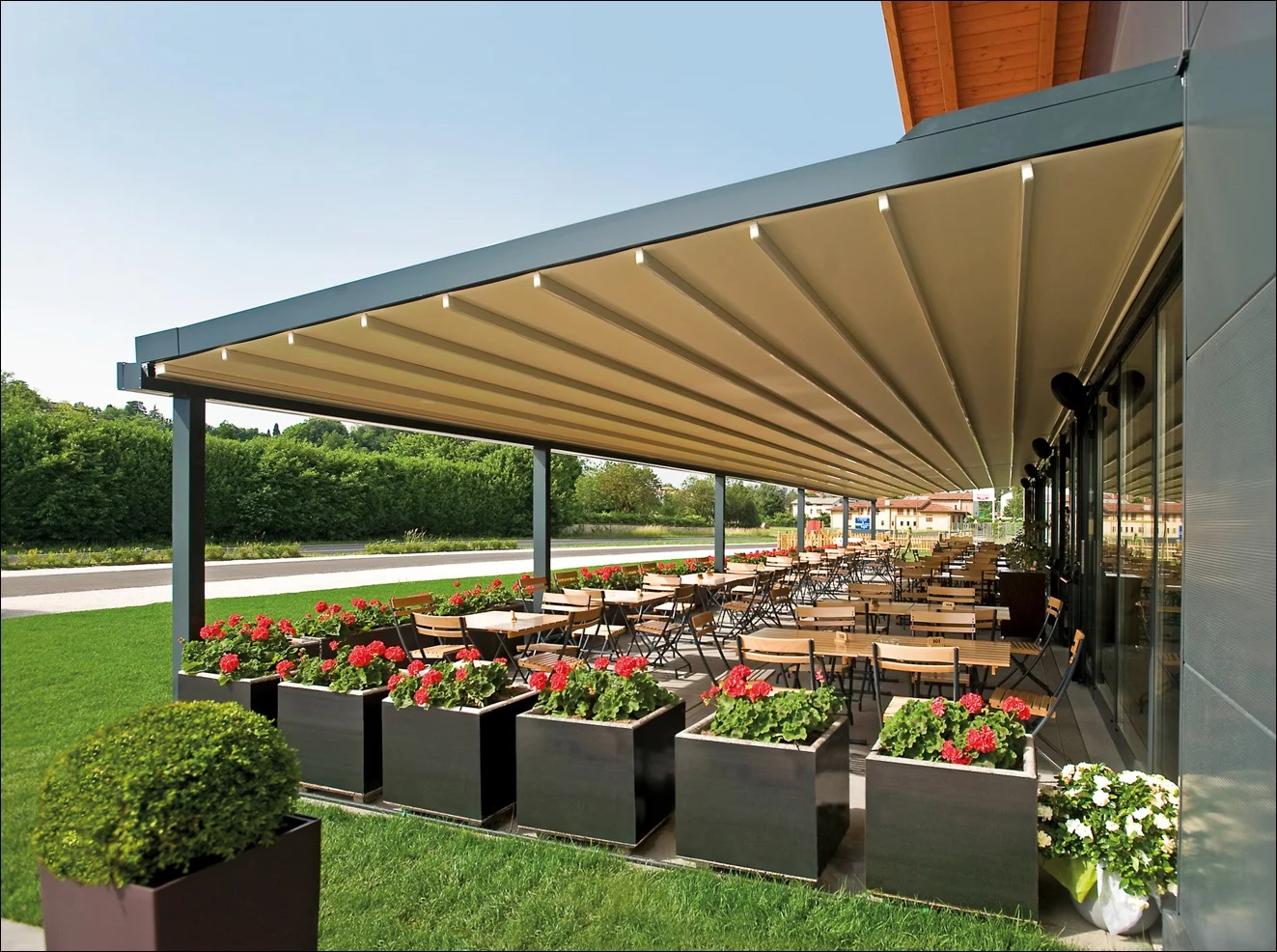 commercial retractable awning over a seating area