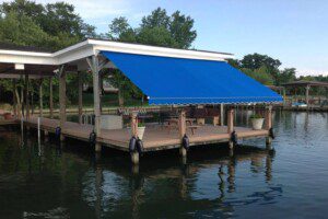 A blue awning on a dock