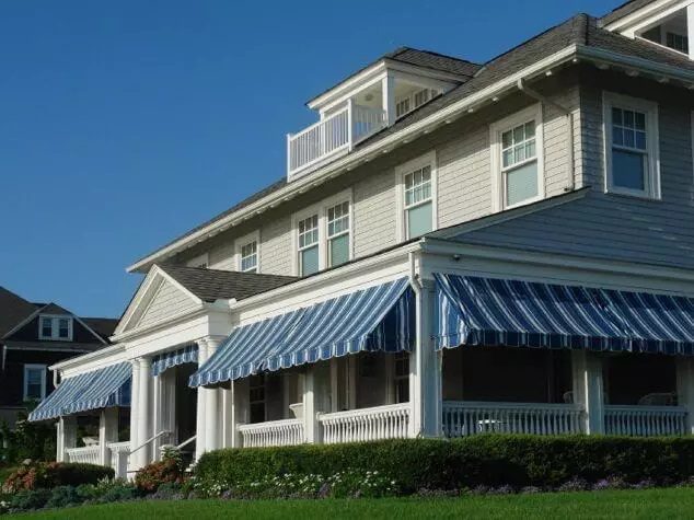 small blue home awnings
