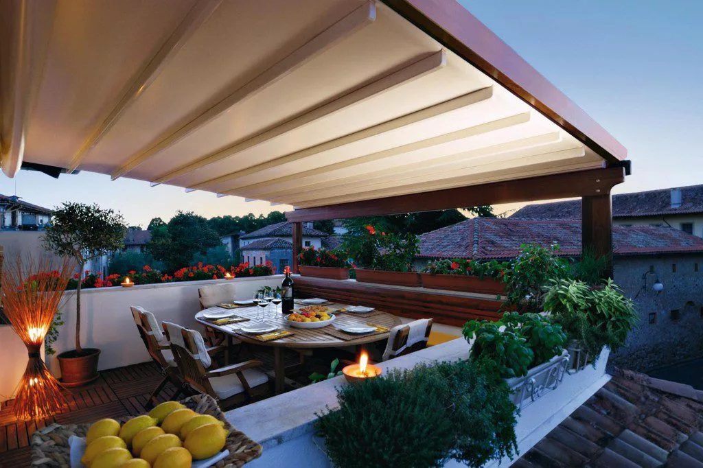 A pergola awning cover at sunset